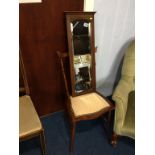 A mahogany bedroom chair and a mirror