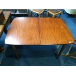 A teak dining table