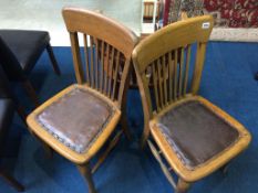 Three oak office chairs