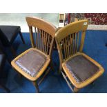 Three oak office chairs