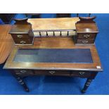 An Edwardian mahogany writing desk