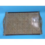 A Christian Dior lucite and rattan serving tray