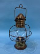 A brass and glass lantern