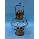 A brass and glass lantern