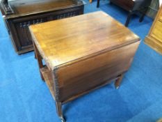 A mahogany tea trolley