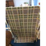 A beige, brown and green Welsh blanket, 154cm x 230cm