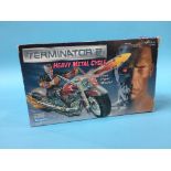 A boxed Terminator Two 'Heavy Metal cycle'