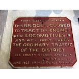 A cast iron sign, dated June 1903