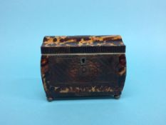 A Georgian tortoiseshell tea caddy,16cm wide, 8.5cm deep, 12cm high