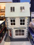 A dolls house modelled as a Pub 'The Last Orders', with contents