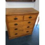 A satinwood chest of five drawers