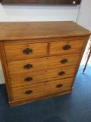 A satinwood chest of five drawers