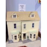 A dolls house and contents