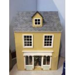 A dolls house and contents