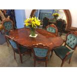 An Italian style dining table and six (4+2) chairs