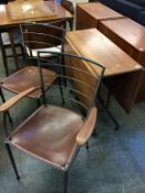 A teak Ladderax gateleg table and two chairs