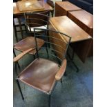 A teak Ladderax gateleg table and two chairs