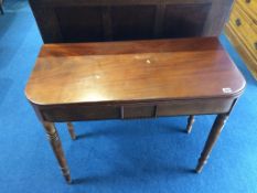 A mahogany tea table