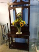 A reproduction mahogany hall stand