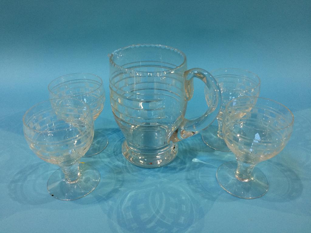 A cut glass lemonade set