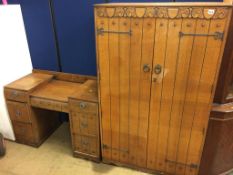 An oak gents wardrobe and dressing chest