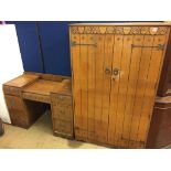 An oak gents wardrobe and dressing chest