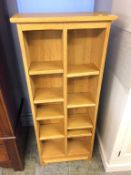 An open oak bookcase, 53cm x 19cm x 129cm