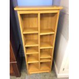 An open oak bookcase, 53cm x 19cm x 129cm