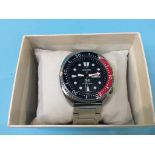 A Seiko x Padi Quartz divers watch and box