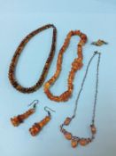 A collection of amber coloured beads and jewellery, 66 grams approx.