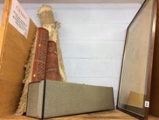 A shelf of assorted, to include rugs