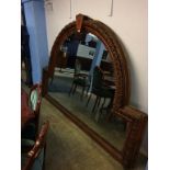 An impressive oak overmantle mirror, 252cm x 175cm