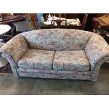 A Paisley sofa bed, as new