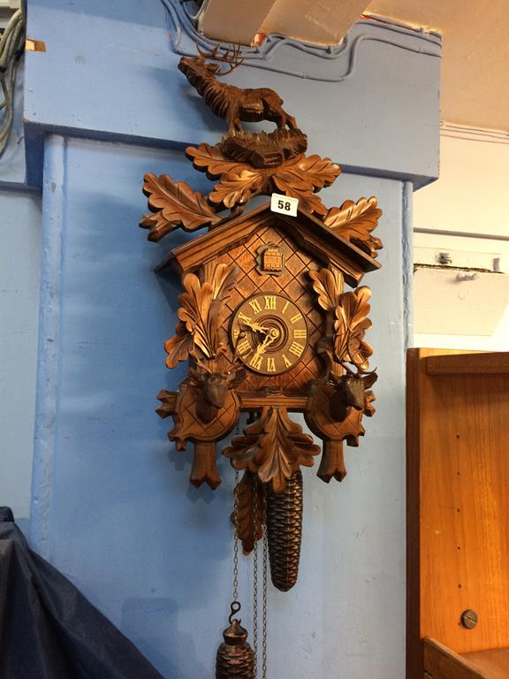 A Cuckoo Clock, approx. 53cm x 31cm