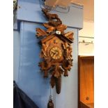 A Cuckoo Clock, approx. 53cm x 31cm