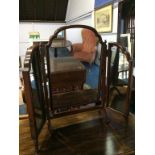 A mahogany dressing table mirror