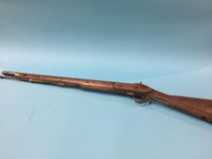 An Antique percussion rifle