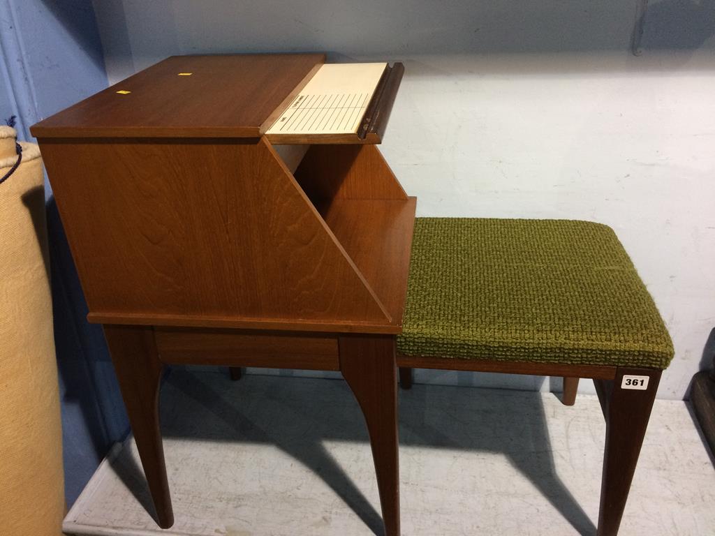 A teak telephone table