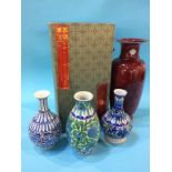 An Oriental vase and three Indian vases