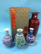 An Oriental vase and three Indian vases