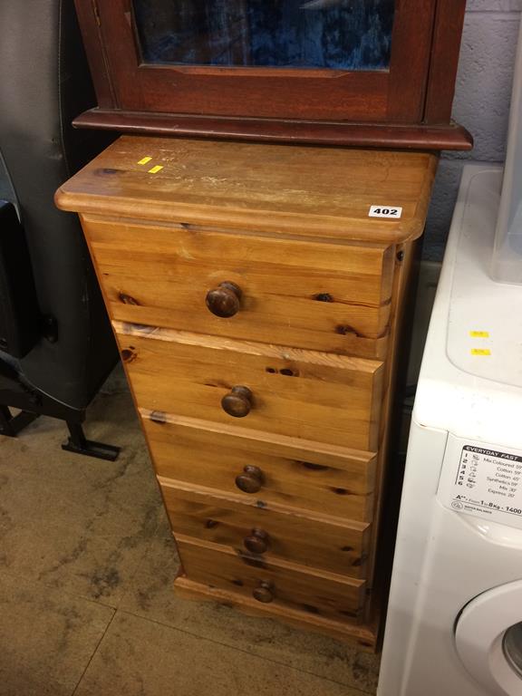 A pine narrow chest of drawers and a corner cabinet - Image 3 of 3