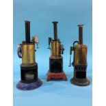 Three tin plate vertical engines