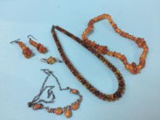 A collection of amber coloured jewellery