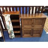 A mahogany four door cabinet and a shoe cabinet