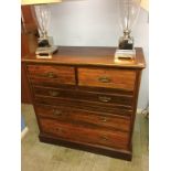 An Edwardian walnut straight fronted chest of drawers. 105cm width