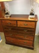 An Edwardian walnut straight fronted chest of drawers. 105cm width