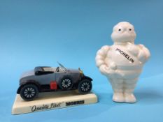 A Carlton Ware Michelin Man and a Bull Nose Morris