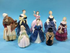 Collection of Royal Doulton and Royal Worcester figures and a Toby jug