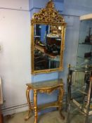 A gilt console table and over mirror