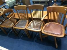 Four various oak 1930s office chairs